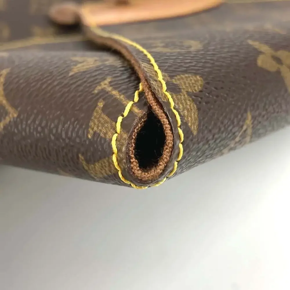 LOUIS VUITTON Brown Monogram Canvas Clutch Bag
